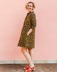 Navy dress with yellow floral vines