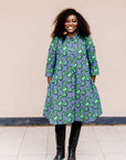 Navy dress with green ribbons