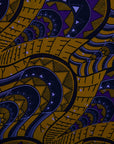 display of a gold and purple empire state building design dress
