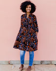 Black dress with orange and white small leaves