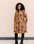 Purple dress with yellow squiggles