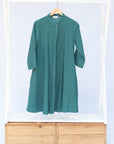 Display of lagoon green linen dress.