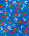 Display of a blue, red and white flower pod design shirt dress