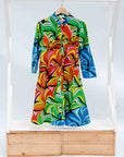 Display of a rainbow swirl design dress