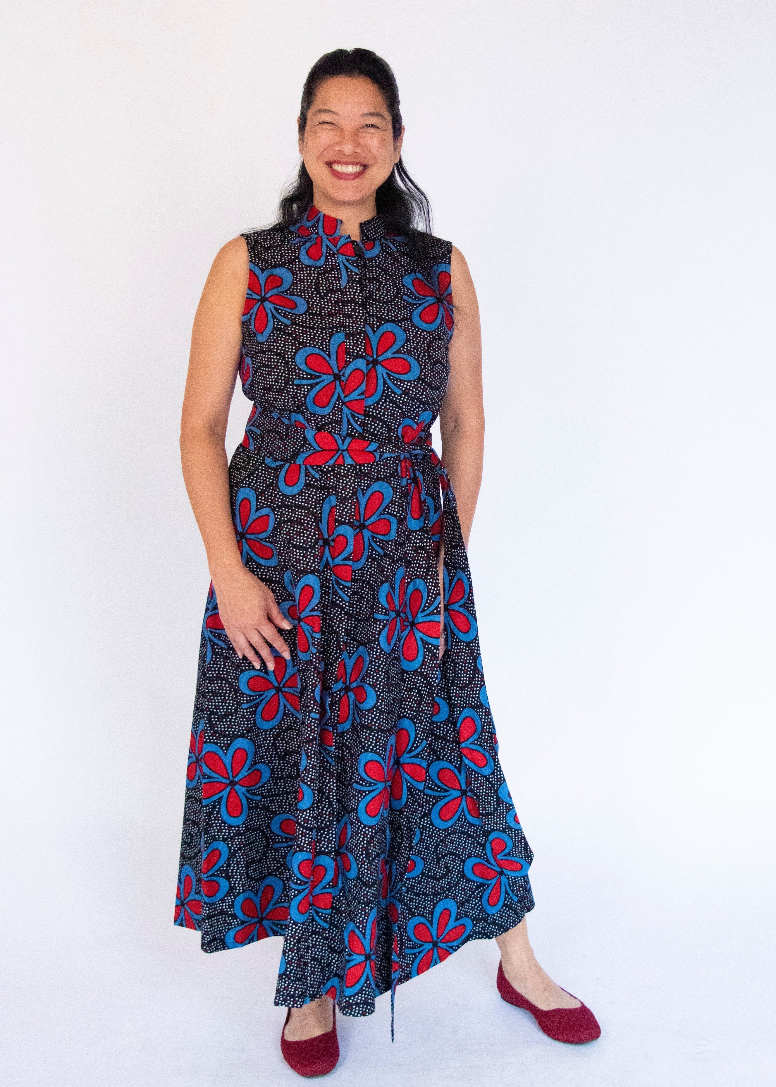 Model wearing floral print maxi dress.