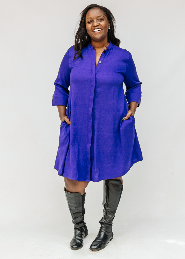 Model wearing deep blue linen dress.