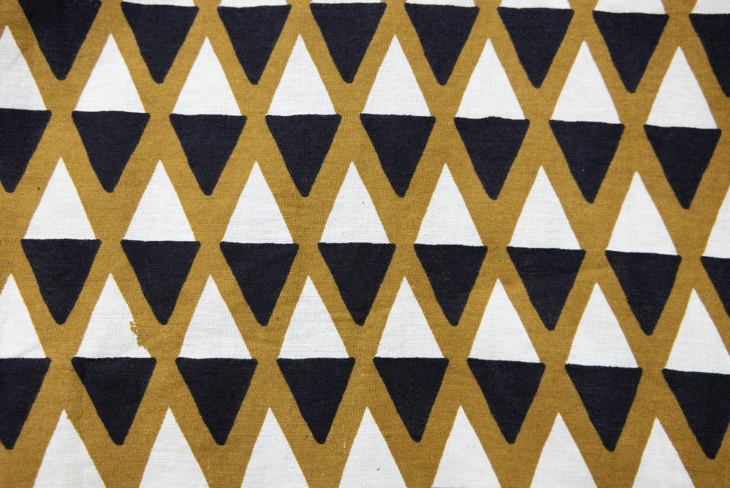 Close up display of black and beige culotte, fabric.