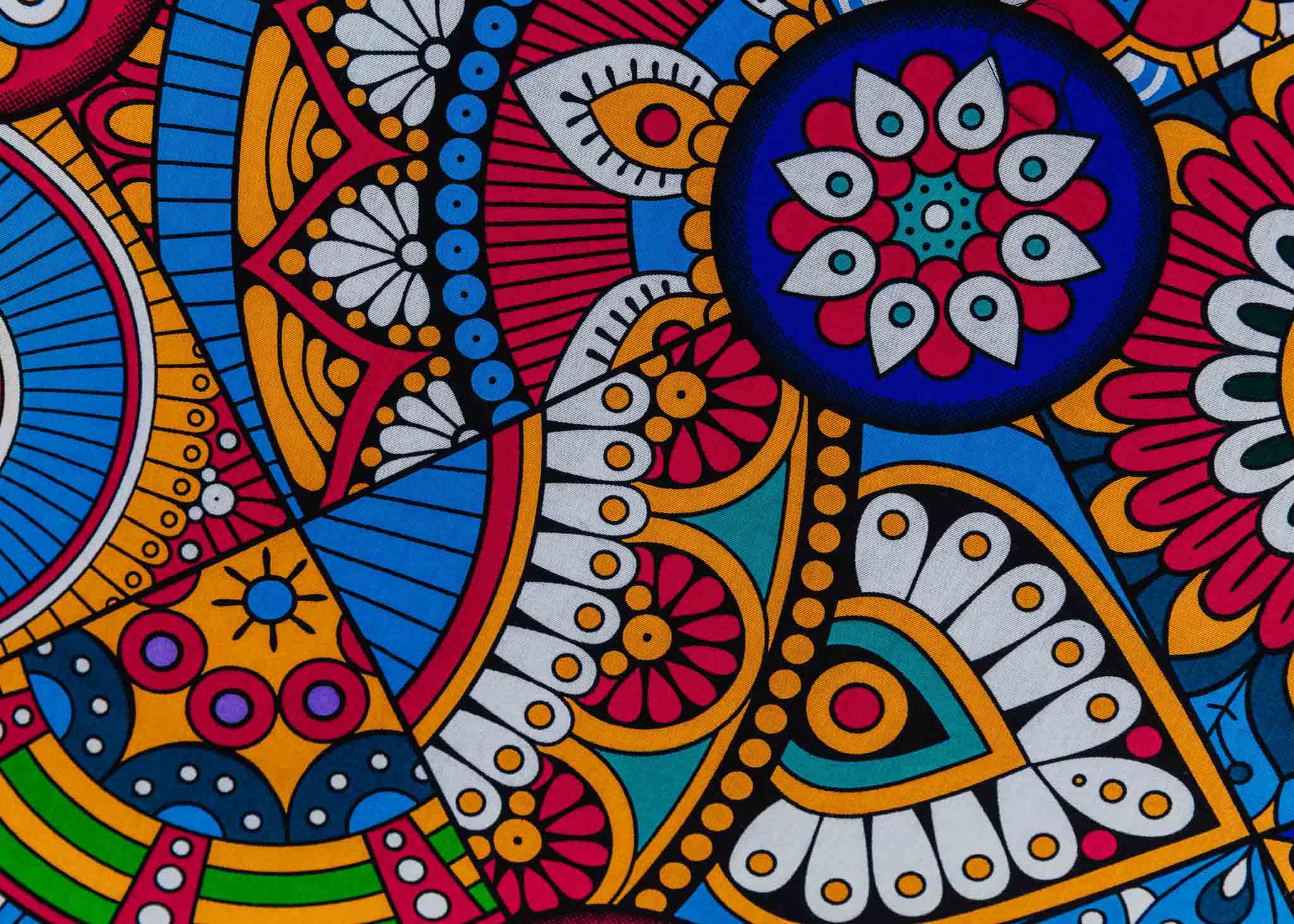 Display of rainbow mosaic print dress.