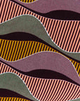 Display of neutral color geometric print dress.