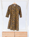 Navy dress with yellow floral vines