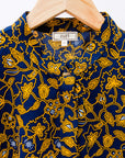 Navy dress with yellow floral vines