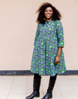 Navy dress with green ribbons
