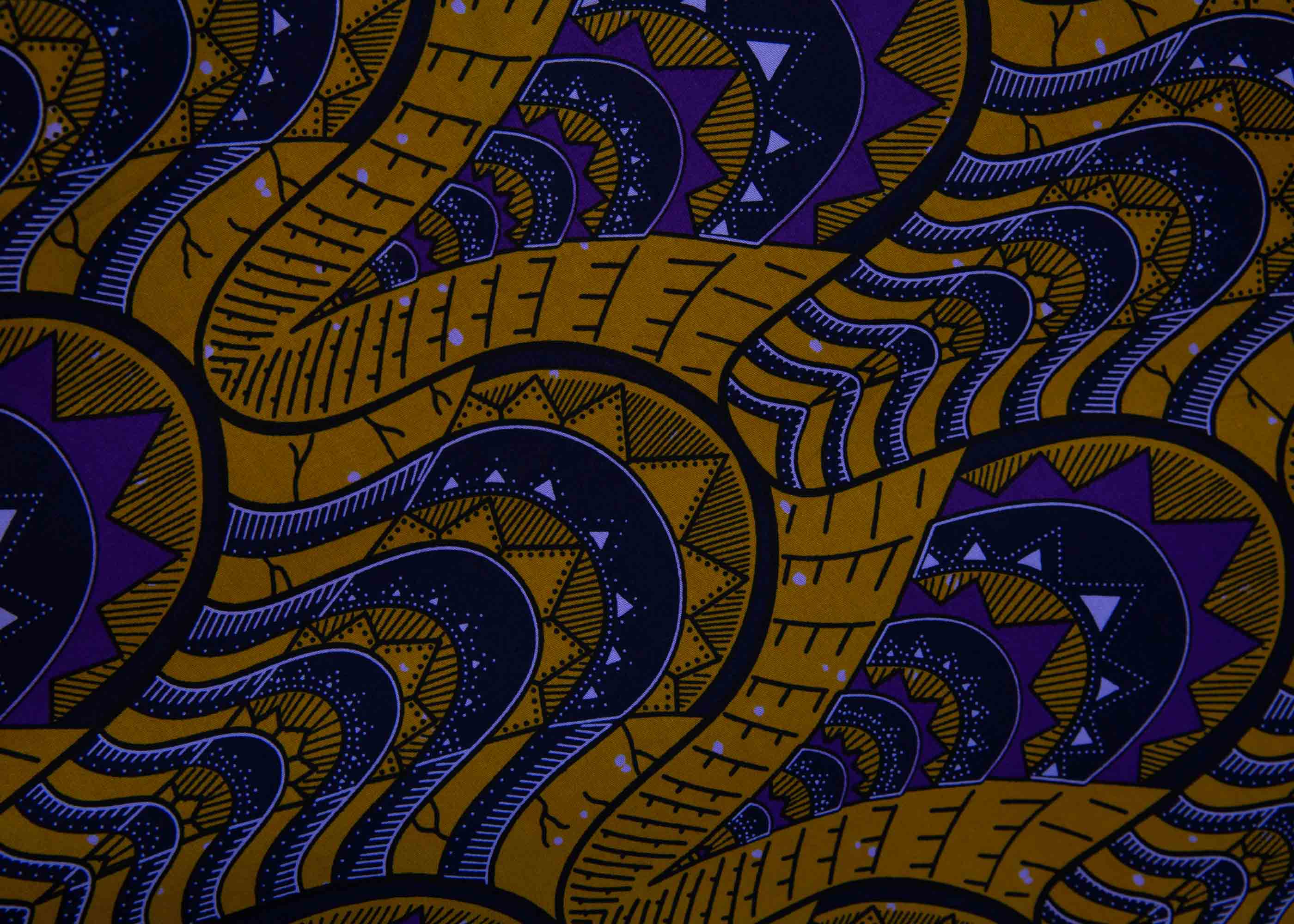 display of a gold and purple empire state building design dress