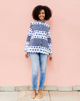 White shirt with blue and black yin yang dots