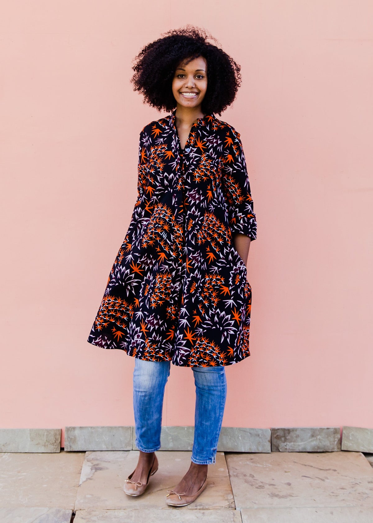 Black dress with orange and white small leaves