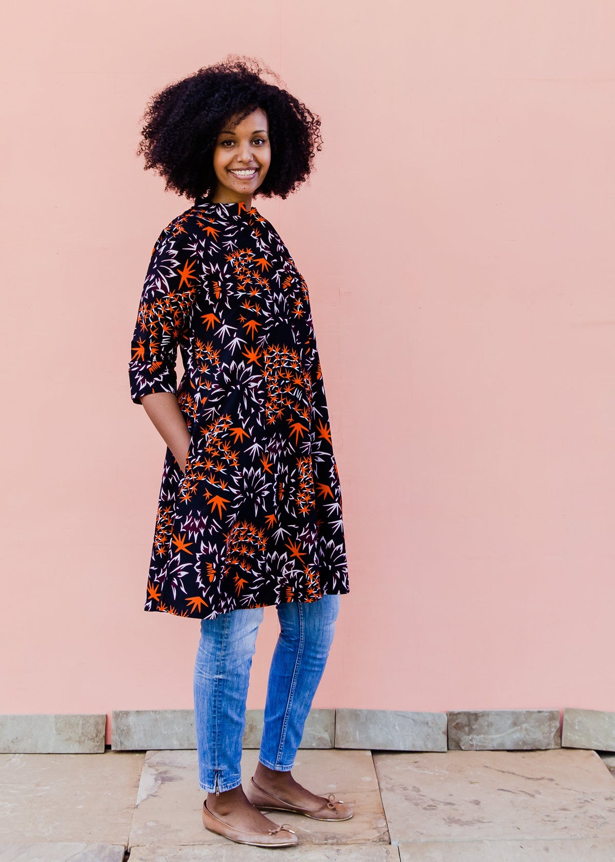 Black dress with orange and white small leaves