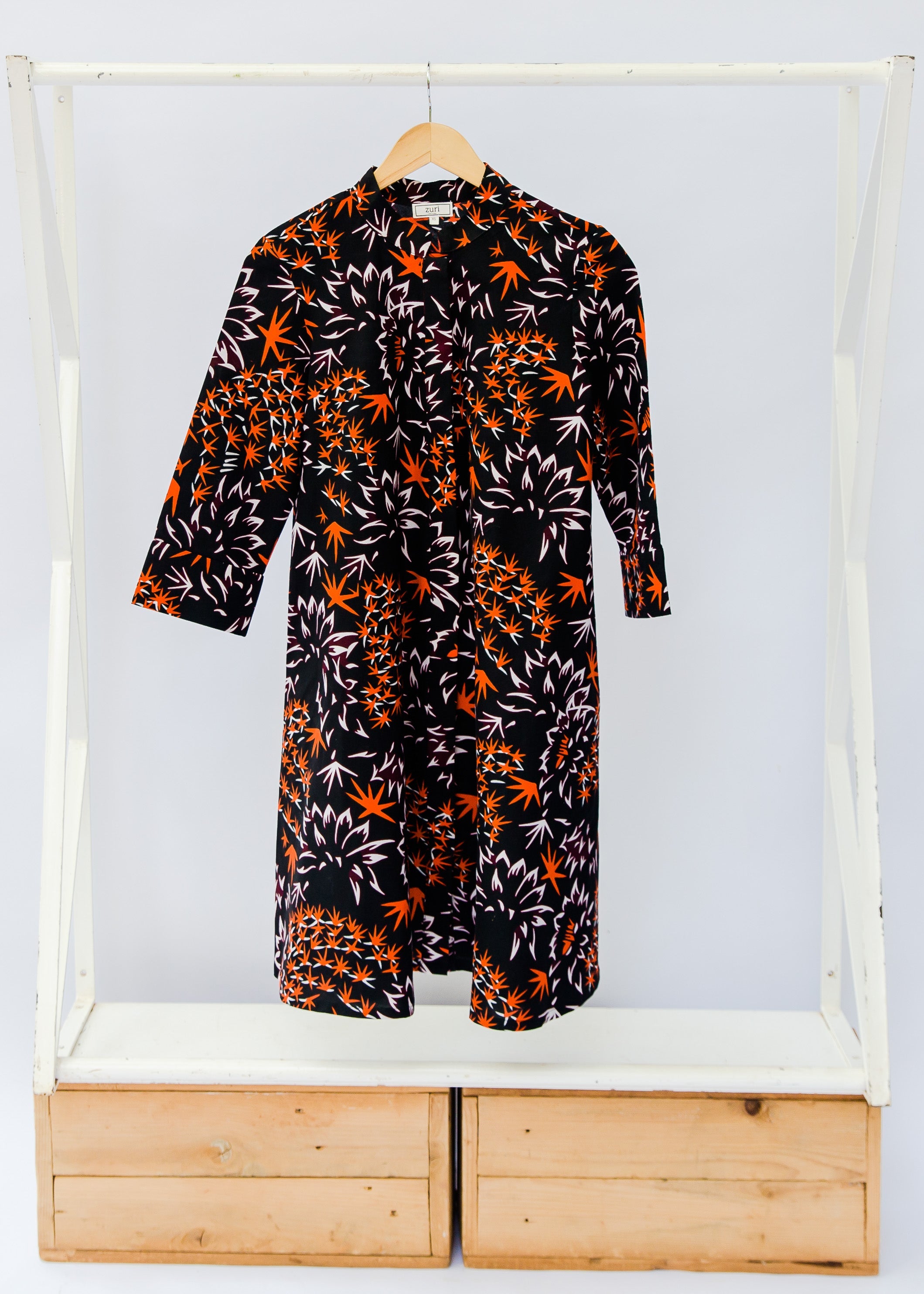 Black dress with orange and white small leaves