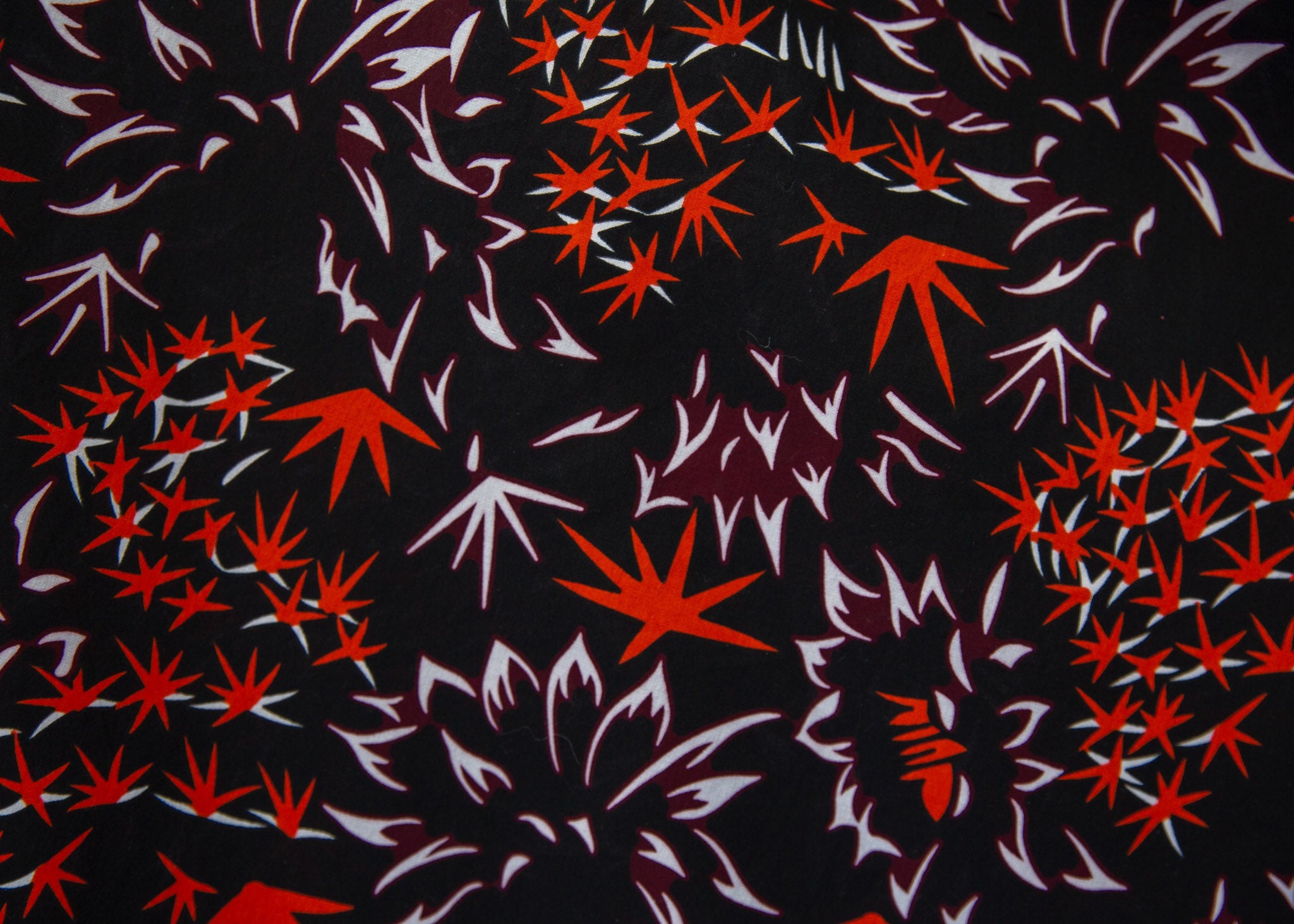 Black dress with orange and white small leaves