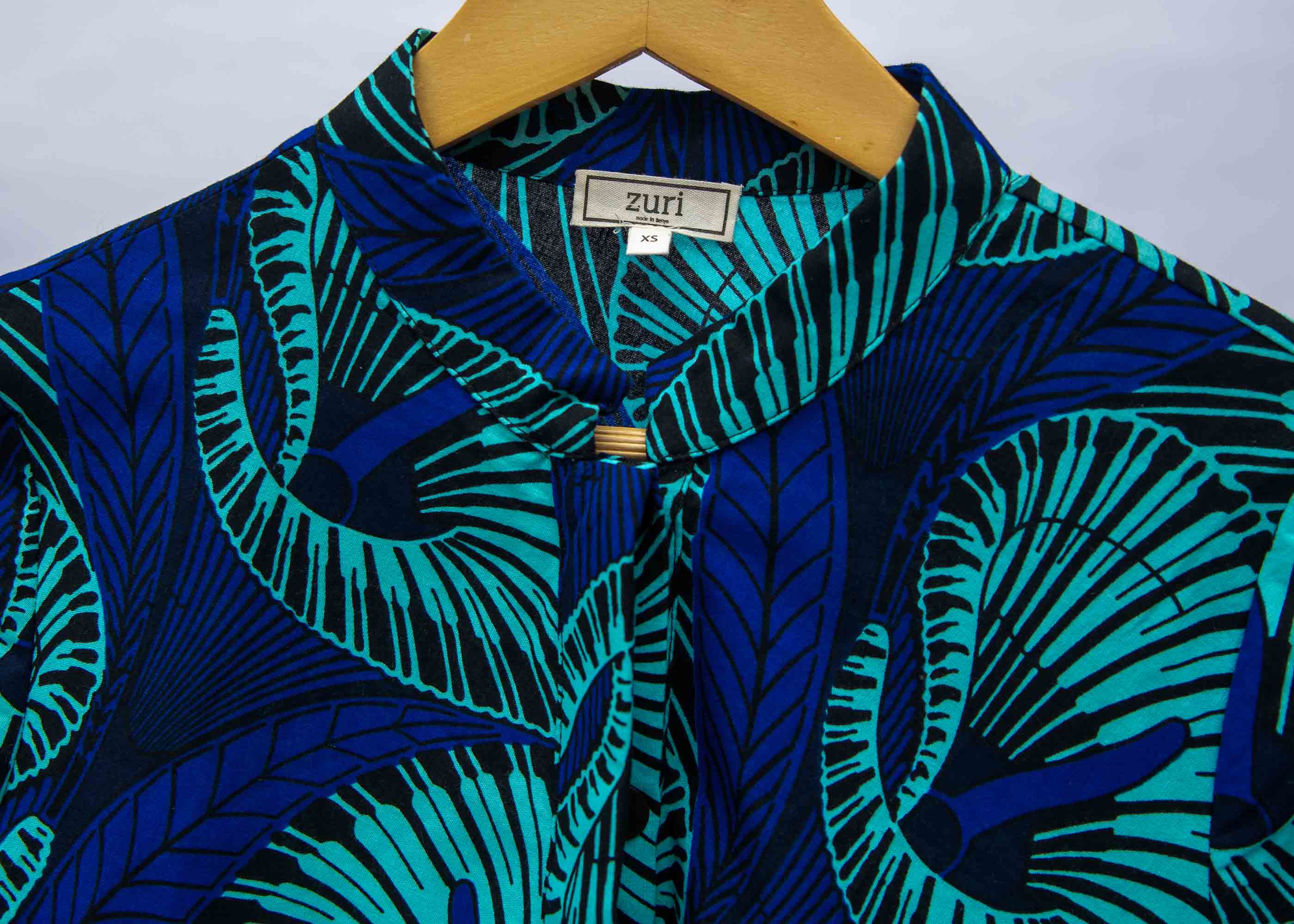 Display of a blue lily design dress