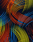 Display of black dress with rainbow brushstroke print.