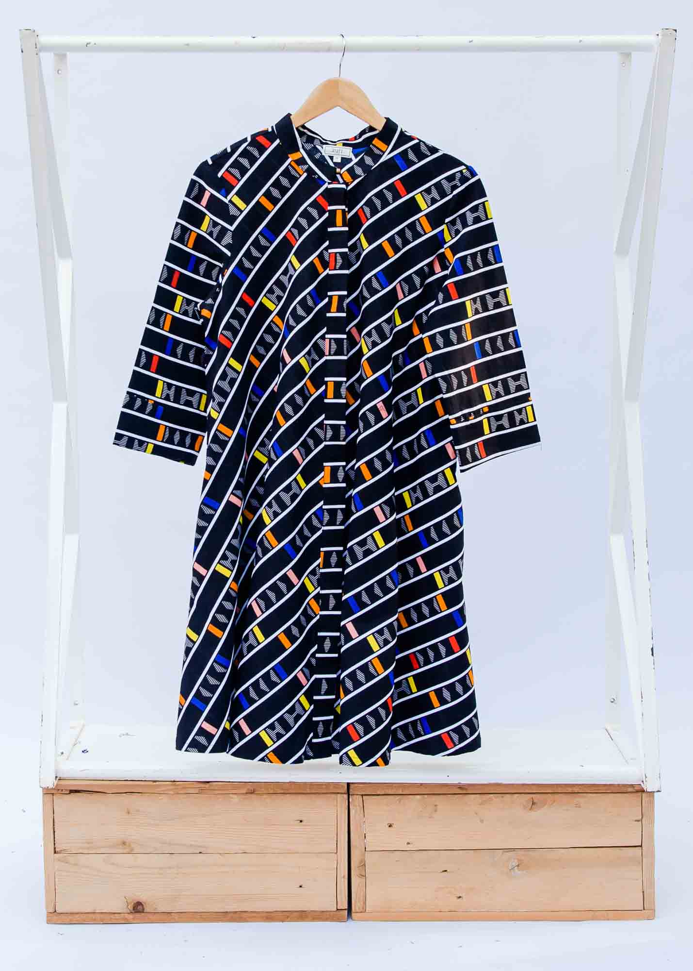 display of a multicolored and black striped dress