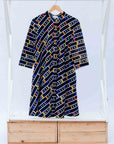 display of a multicolored and black striped dress
