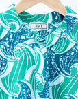 Blue and teal wave print dress