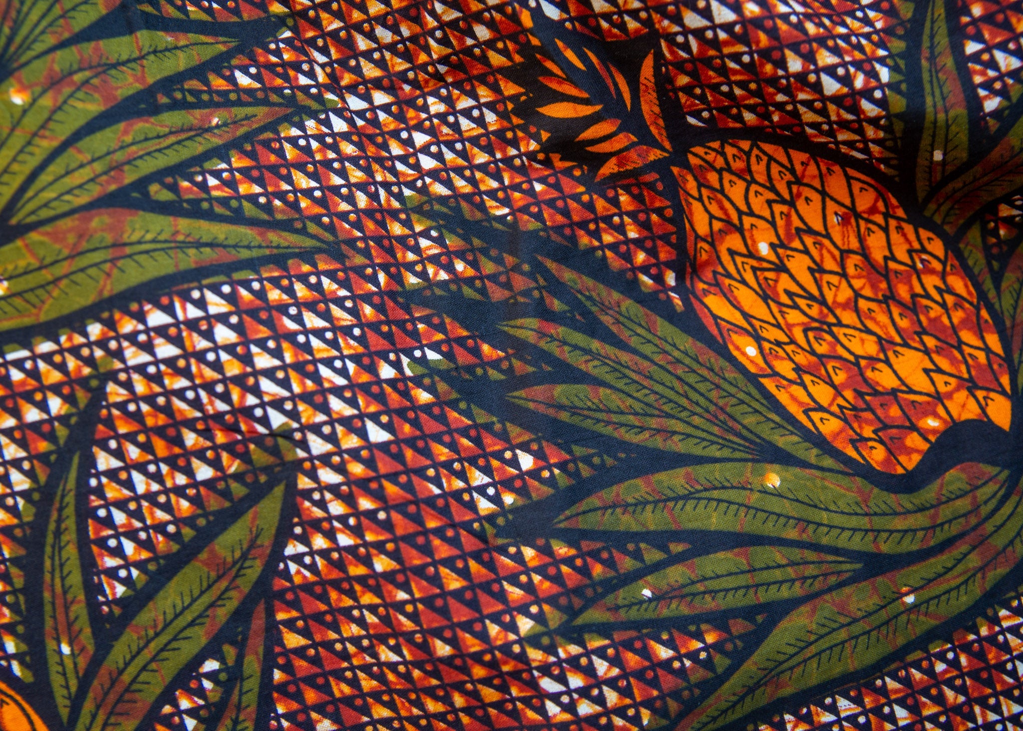 Brown, orange and green pineapple shirt