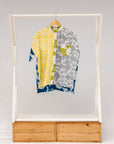 Display of mutlicolored batik shortsleeved shirt.