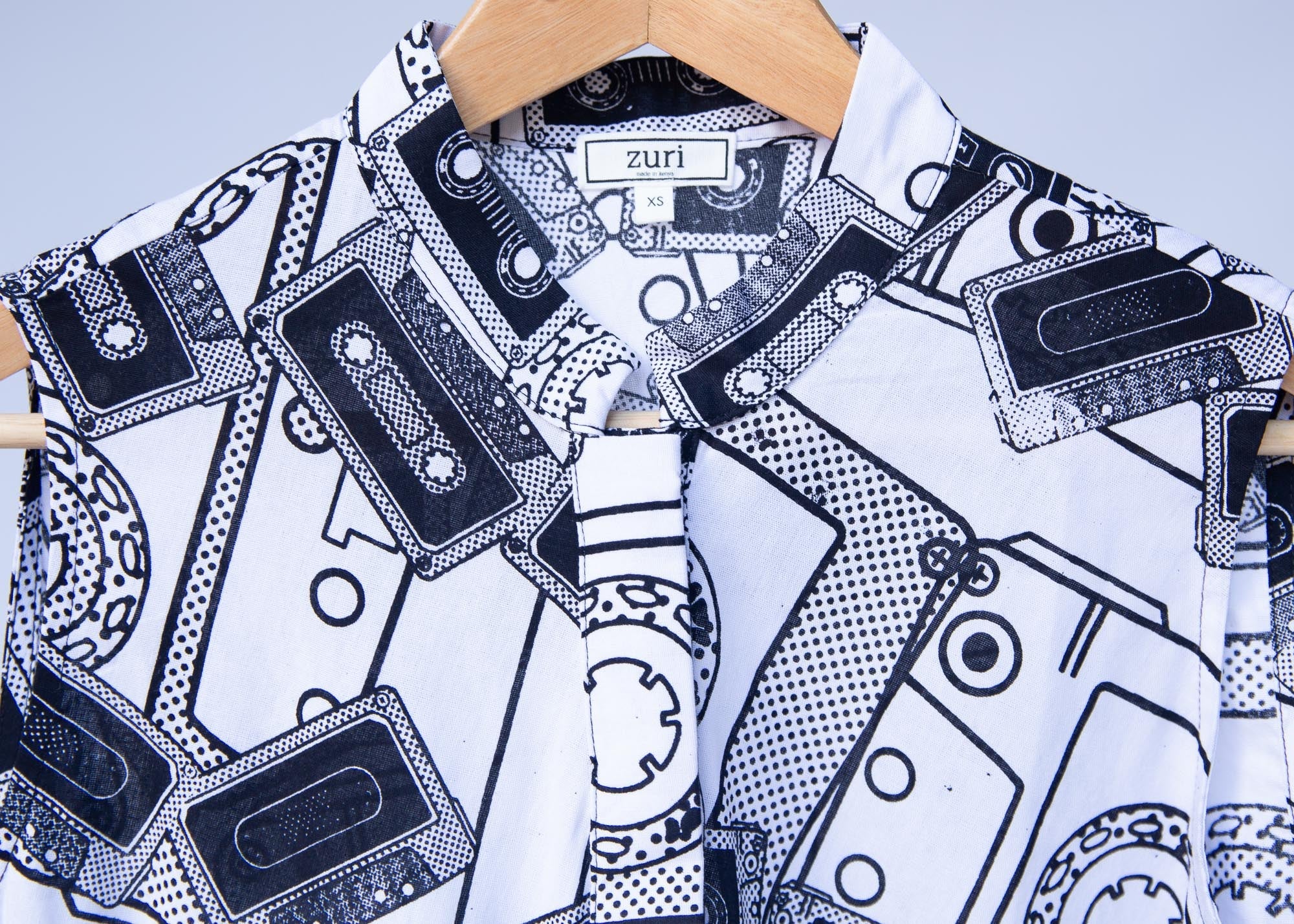 Display of black and white pictorial print with tapes 