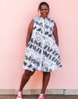 The model is wearing black and white pictorial print with tapes 