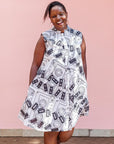 The model is wearing black and white pictorial print with tapes 