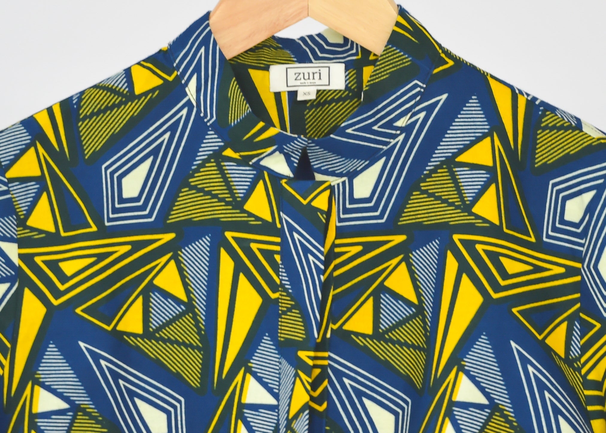 Blue yellow and white geometric shirt