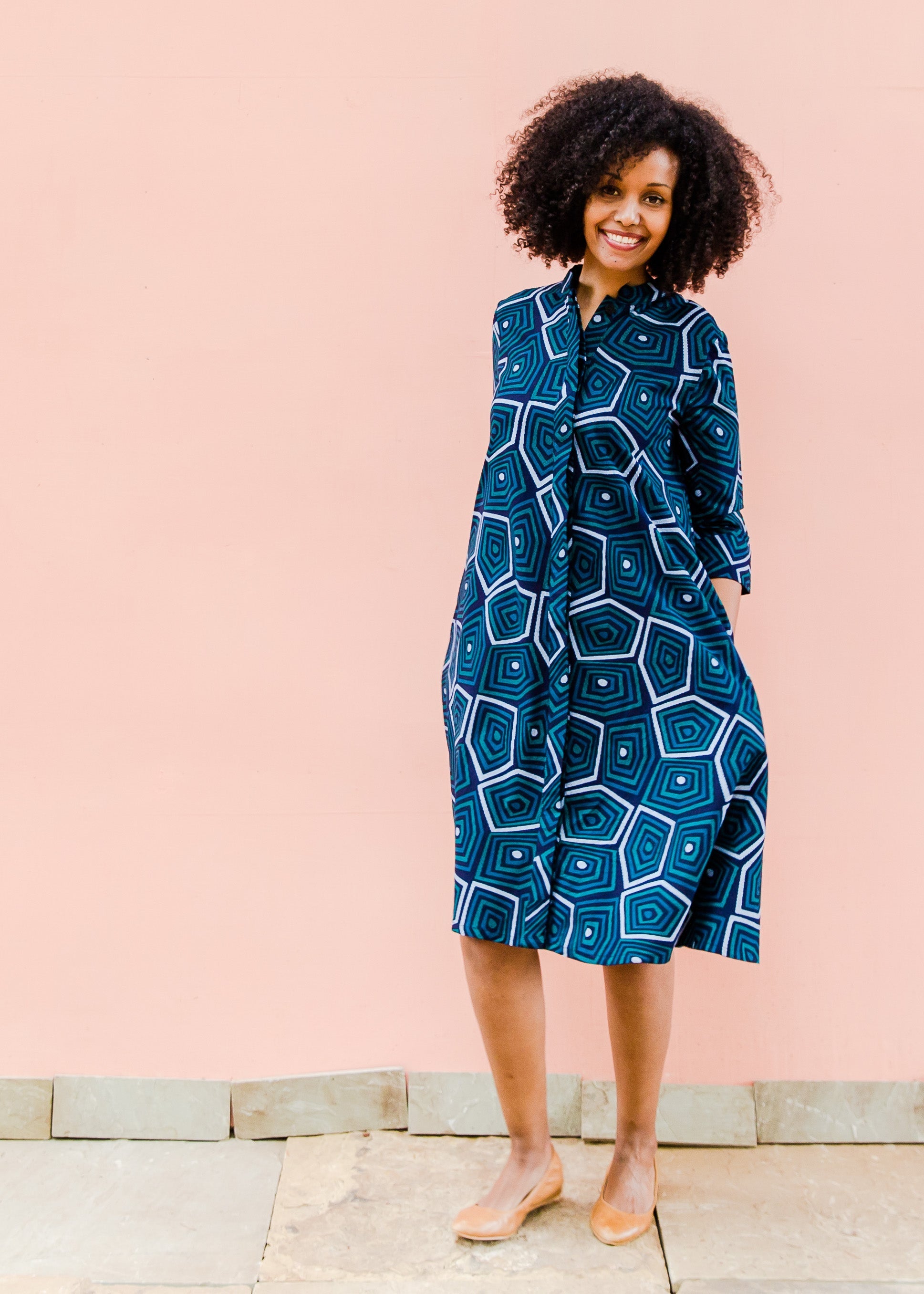 Navy background with blue, green and white dress