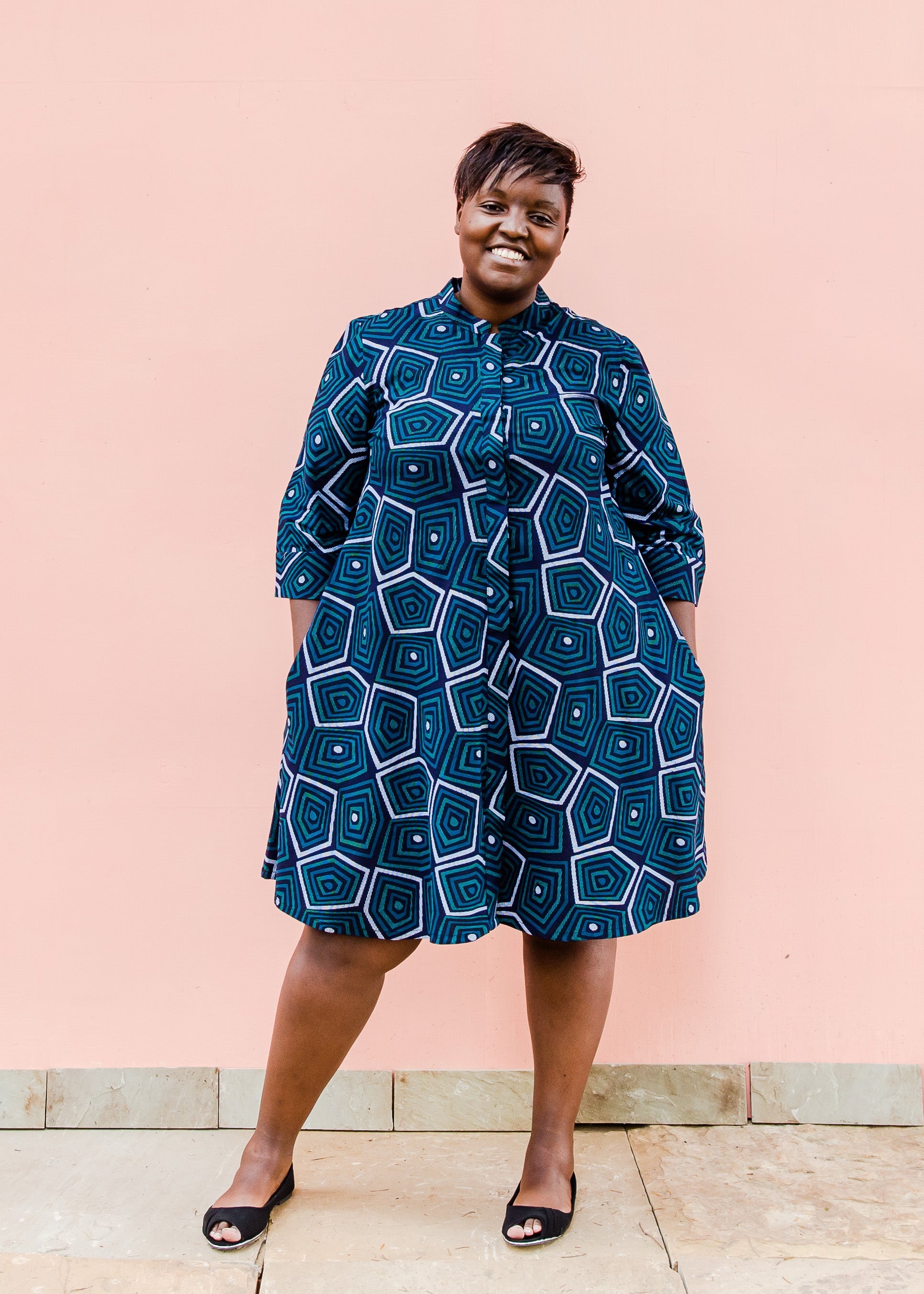 Navy background with blue, green and white dress