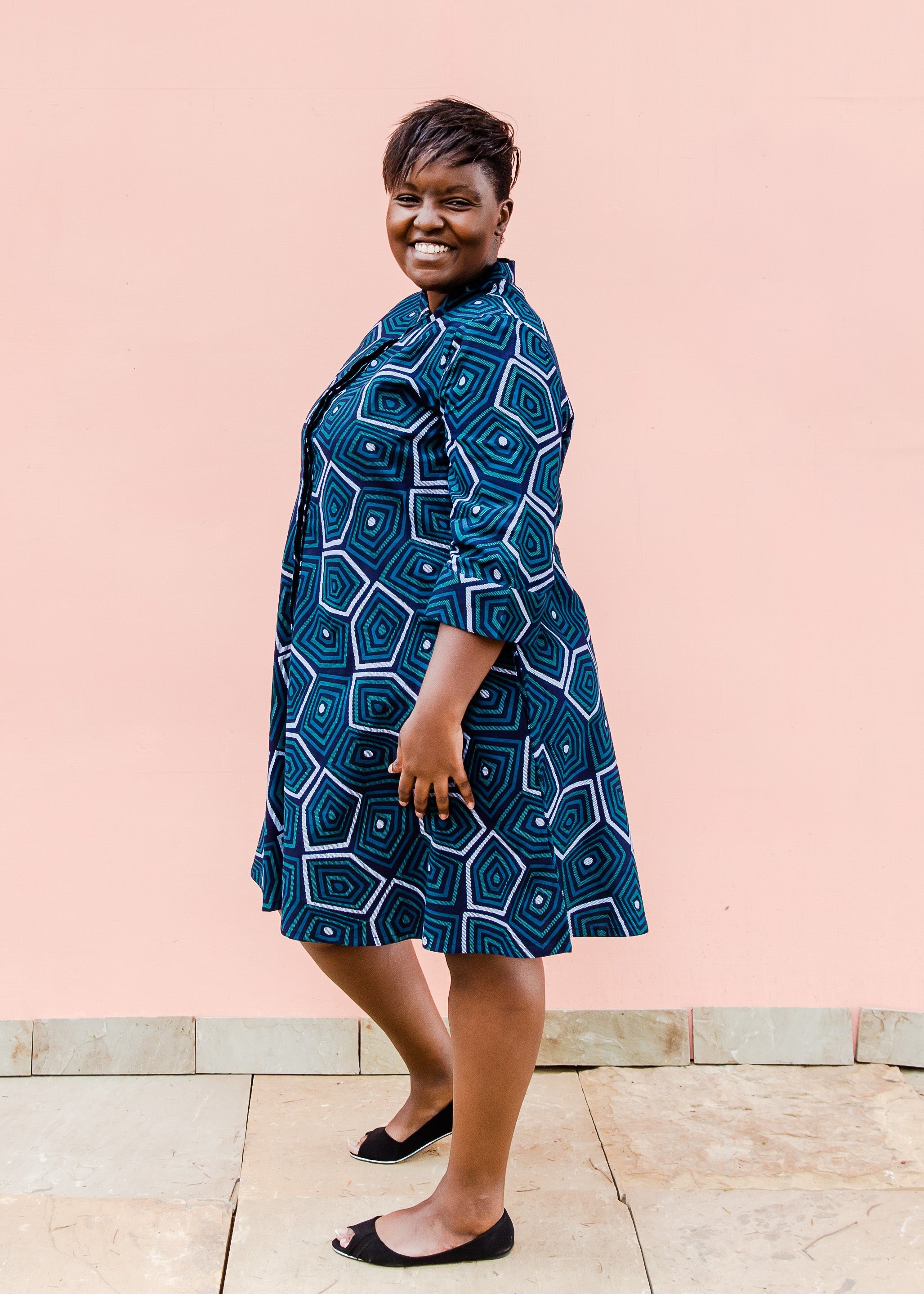 Navy background with blue, green and white dress