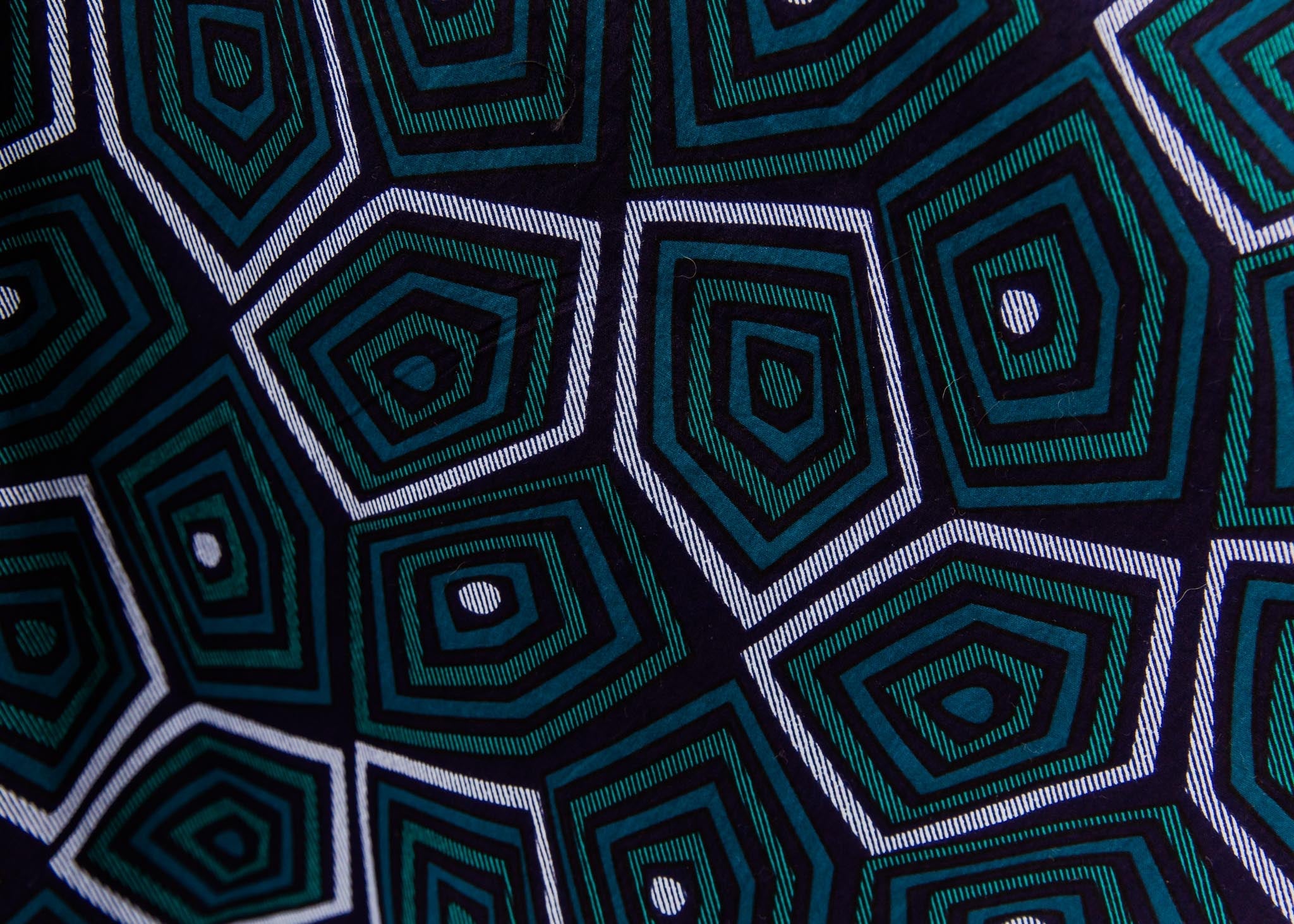 Navy background with blue, green and white dress