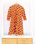 Yellow dress with purple design