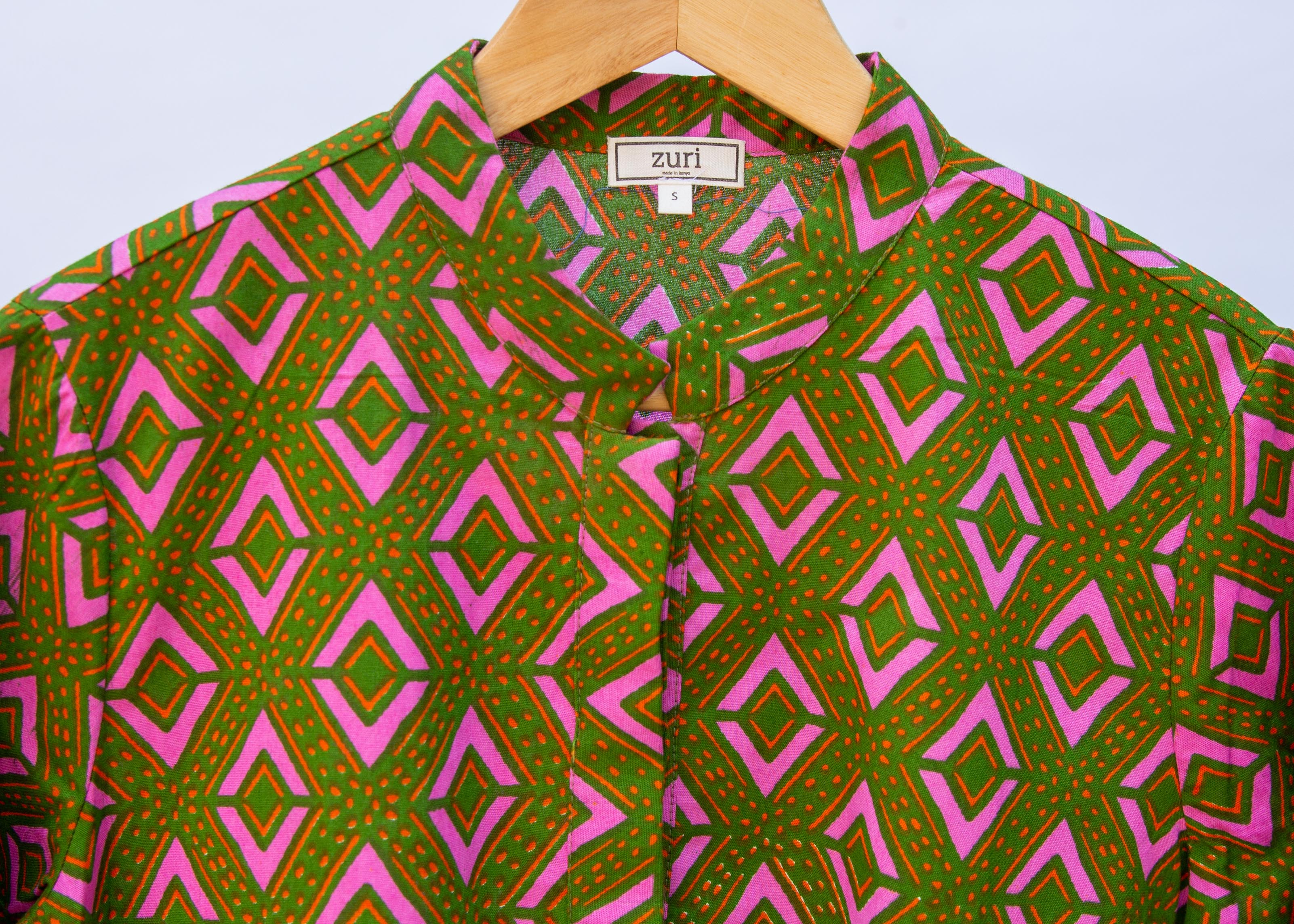 pink and green diamond print dress